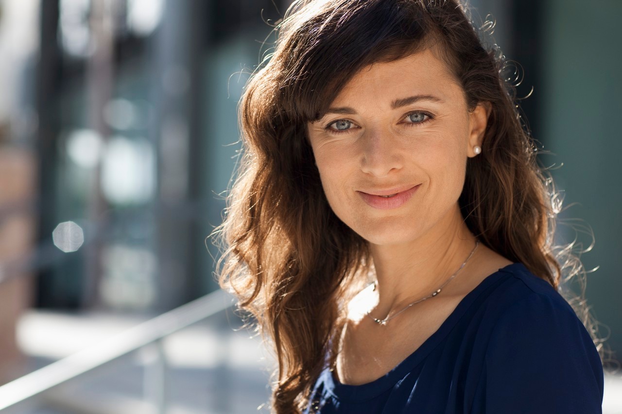 13 May 2014 --- Caucasian woman smiling outdoors --- Image by © Kevin Dodge/Blend Images/Corbis