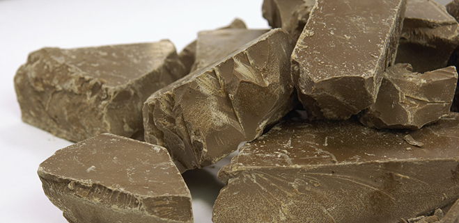 42-19711776 Chocolate pieces --- Image by © Beau Lark/Corbis