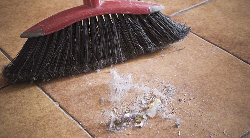 42-23531957 Broom and dirt --- Image by © Ken Welsh/Design Pics/Corbis