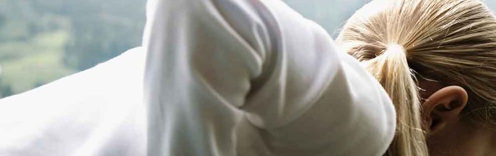 25 Apr 2014 --- Young Woman pinching her waist --- Image by © PhotoStock-Israel/Corbis