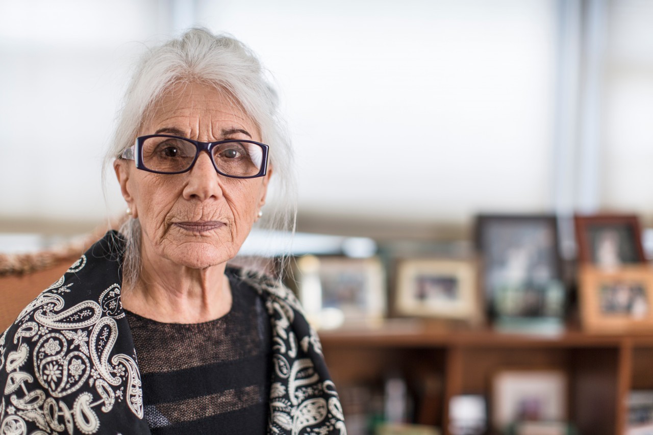 18 Mar 2015 --- Portrait of senior woman wearing eyeglasses at home --- Image by © Steve Prezant/Corbis