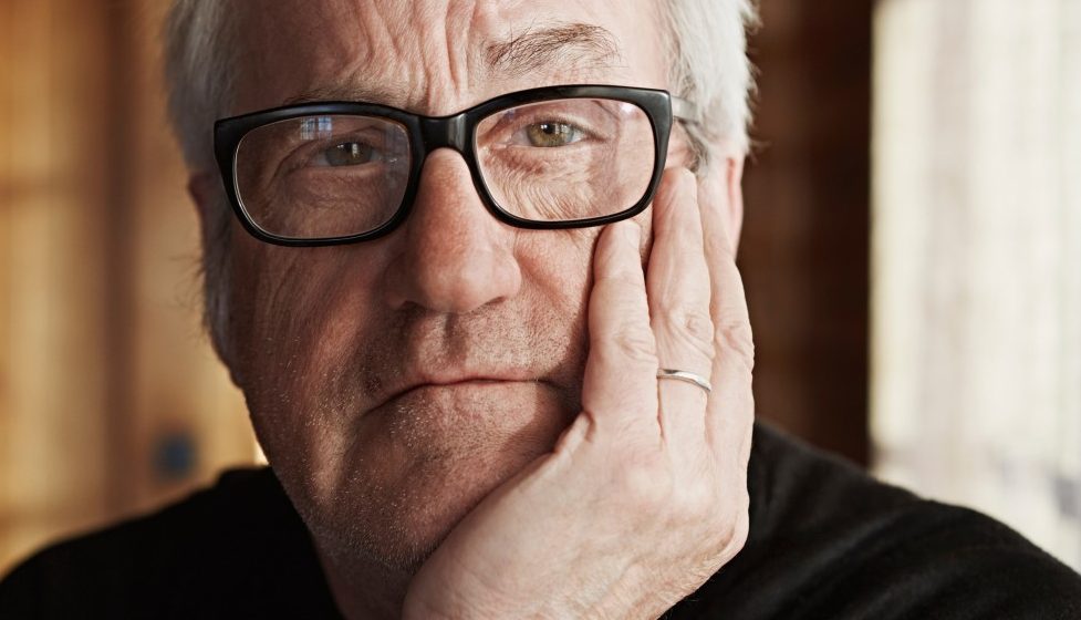 Senior man with grey hair and glasses --- Image by © Frank and Helena/Corbis