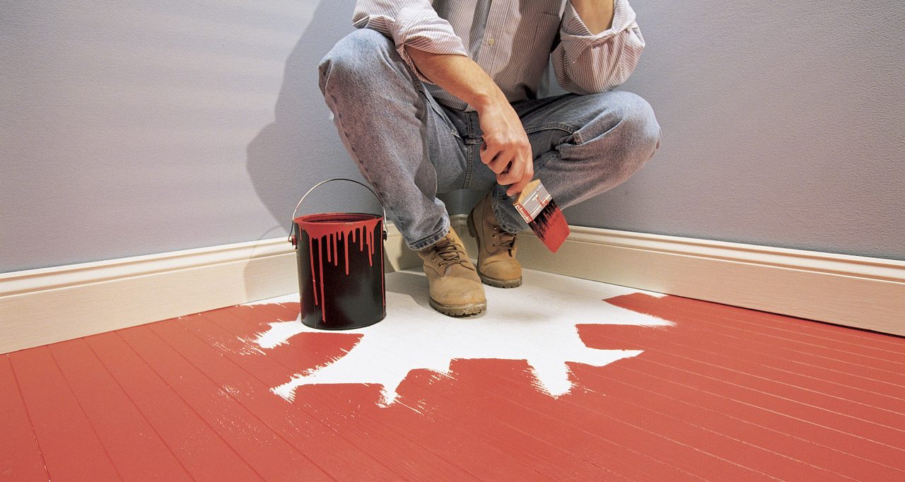 Man Painting Himself into Corner --- Image by © 68/Ocean/Corbis