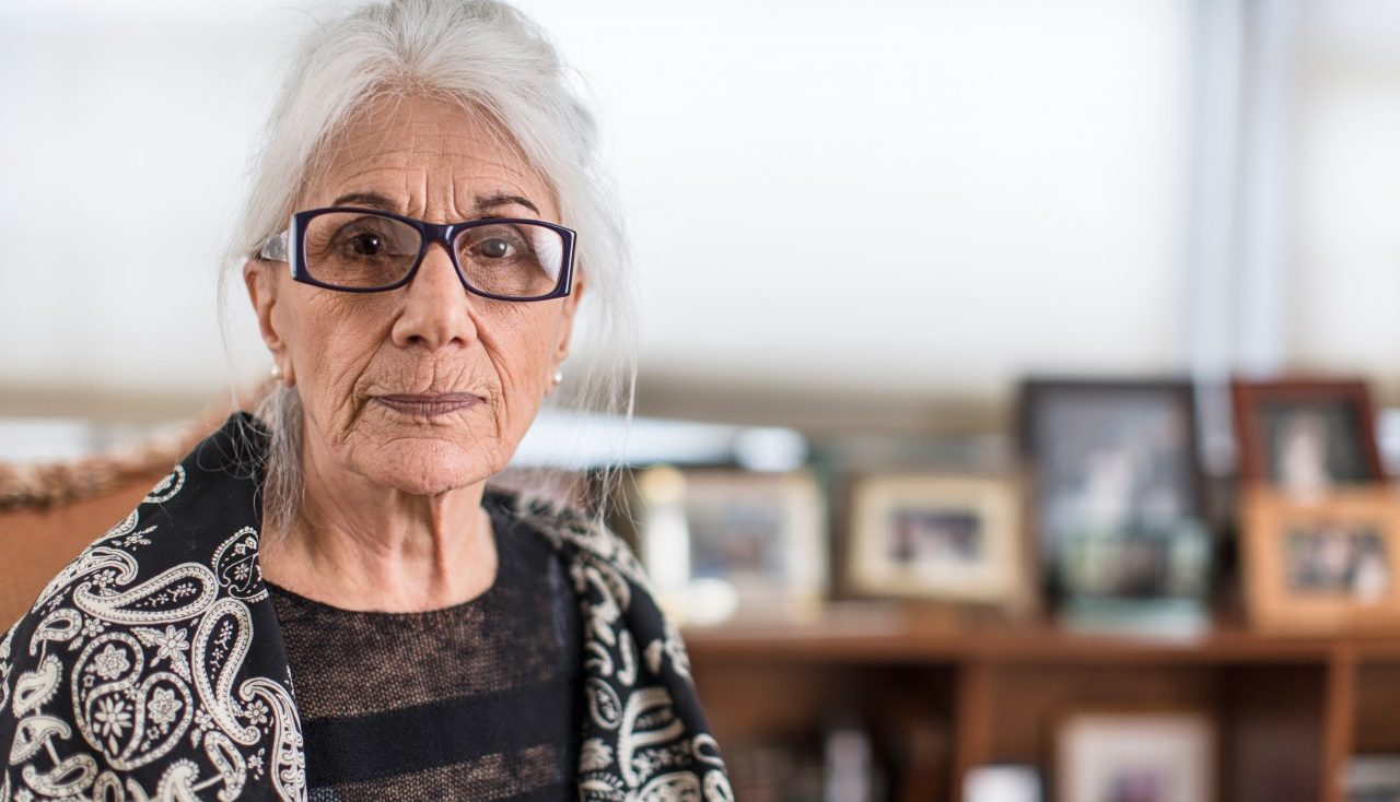 18 Mar 2015 --- Portrait of senior woman wearing eyeglasses at home --- Image by © Steve Prezant/Corbis