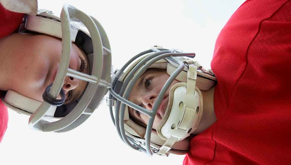 Pediatricians Urge Improved Football Safety for Kids