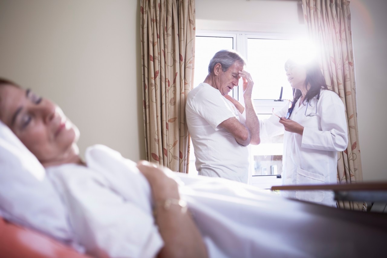 11 Sep 2014 --- Doctor consoling senior man in hospital --- Image by © zerocreatives/Westend61/Corbis