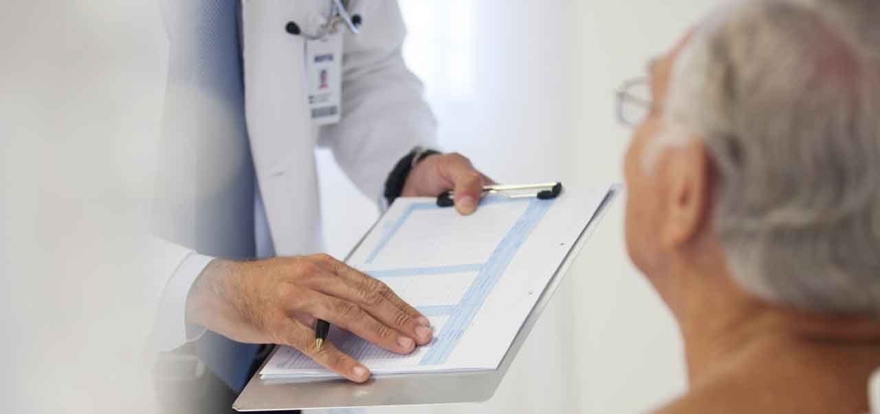 Doctor talking to patient about how to prevent colon cancer recurrence