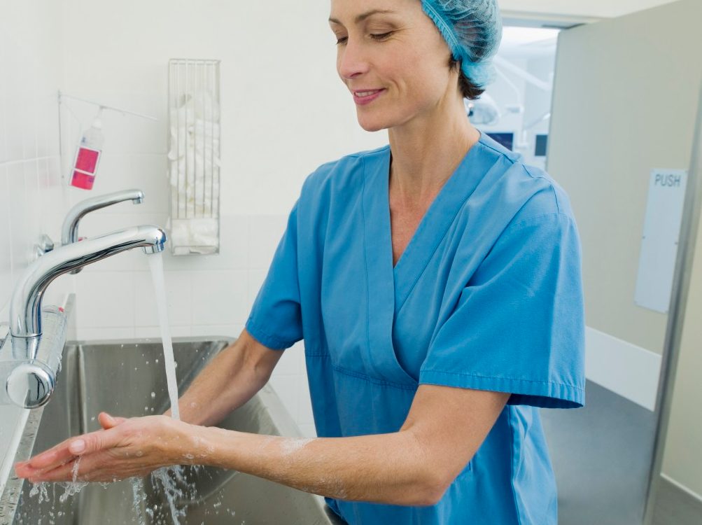 0042-11-30T00:00:00.000Z Surgeon washing hands before operation --- Image by © 237/Chris Ryan/Ocean/Corbis