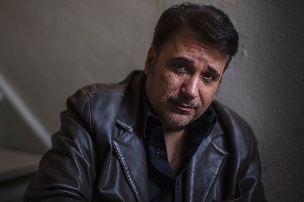 0042-11-30T00:00:00.000Z 08 Nov 2014 --- Portrait of mature man sitting alone on stairway --- Image by © Steve Prezant/Corbis