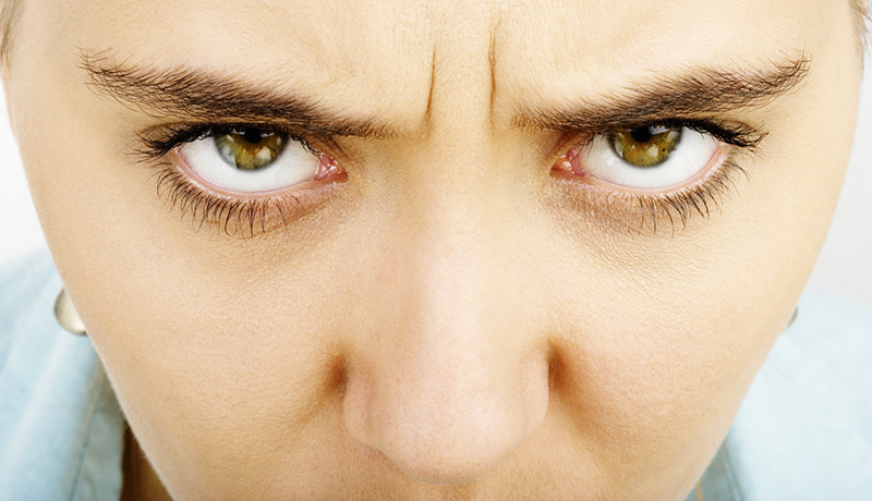 42-18159046 Angry Woman --- Image by © David Sutherland/Corbis