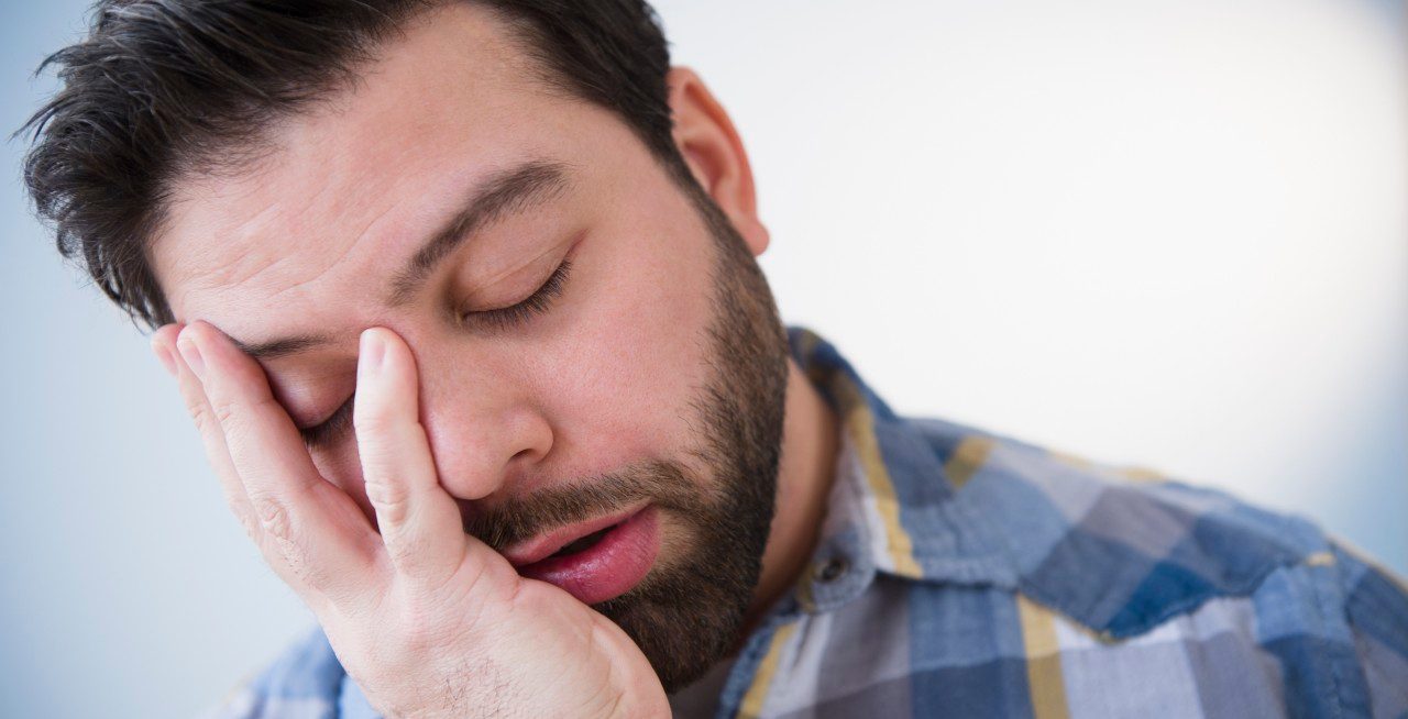 0042-11-30T00:00:00.000Z 20 Feb 2013 --- Portrait of tired man --- Image by © Jamie Grill/Tetra Images/Corbis
