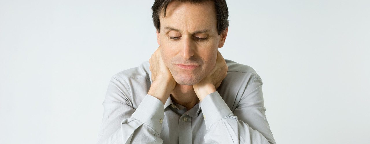 0042-11-30T00:00:00.000Z Man Sitting Next To Pills, Holding Neck, Looking Down --- Image by © Michele Constantini/PhotoAlto/Corbis