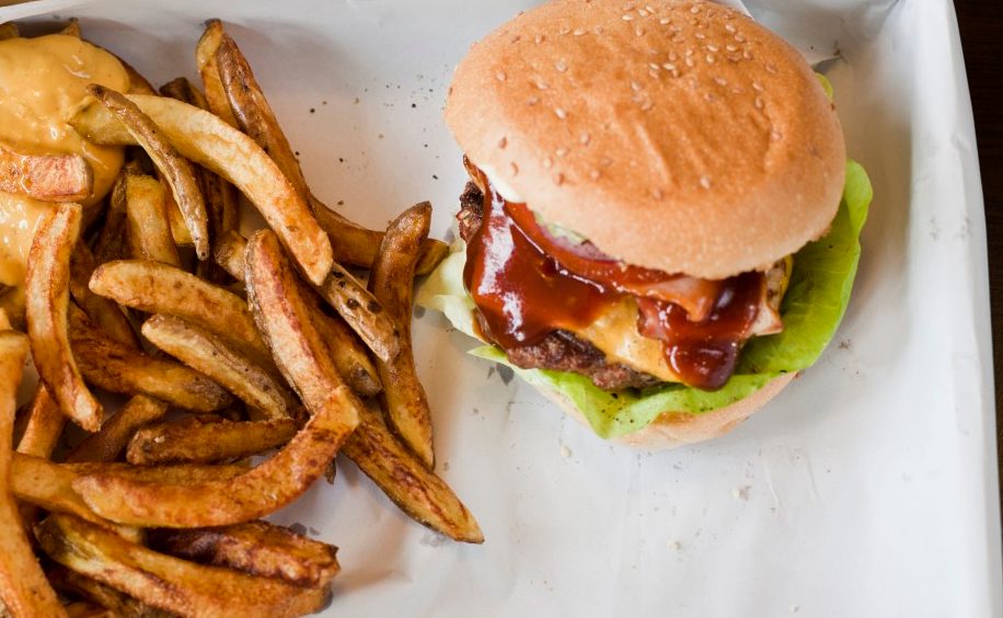 0042-11-30T00:00:00.000Z 14 May 2014 --- Box with hamburger and French Fries with sauce --- Image by © Felix Eisenmeier/Westend61/Corbis
