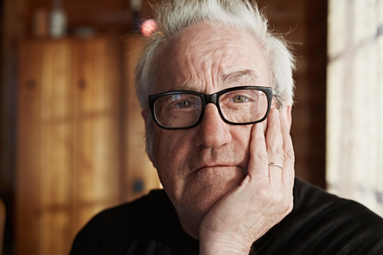 Senior man with grey hair and glasses --- Image by © Frank and Helena/Corbis