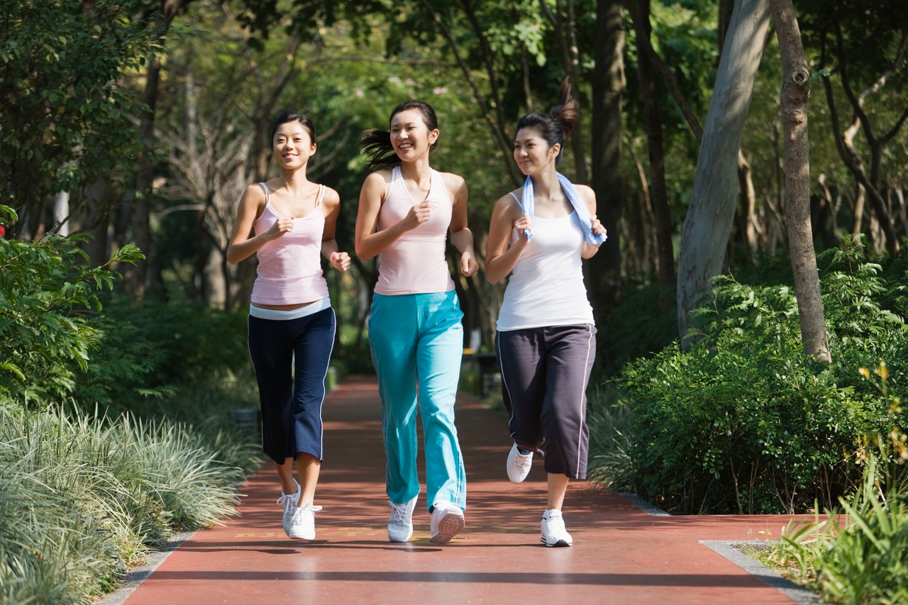 Young Women Power Walking --- Image by © Redlink Production/Corbis