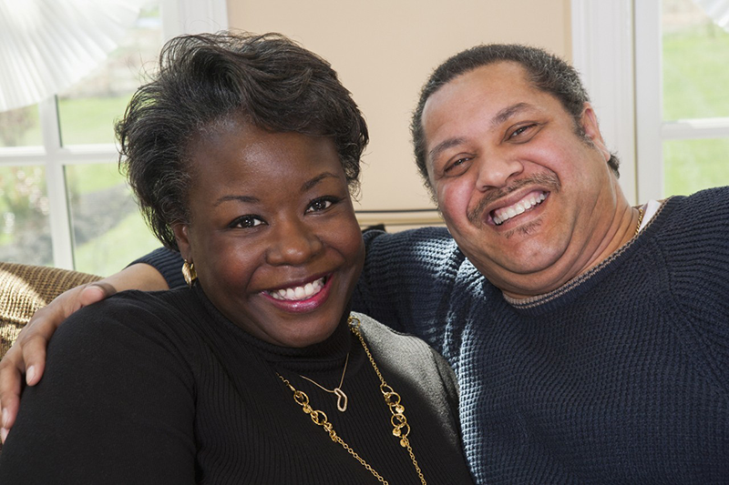 Portrait of Happy Mature Couple at Home --- Image by © Radius Images/Corbis