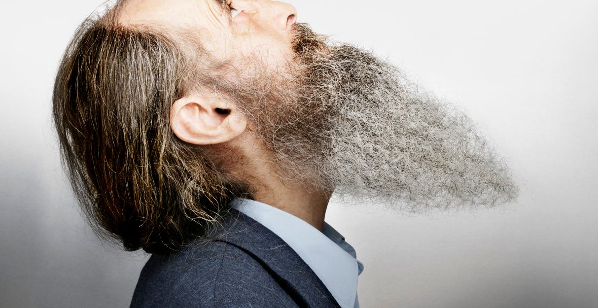 Bearded Man Looking Up --- Image by © John Rensten/Corbis