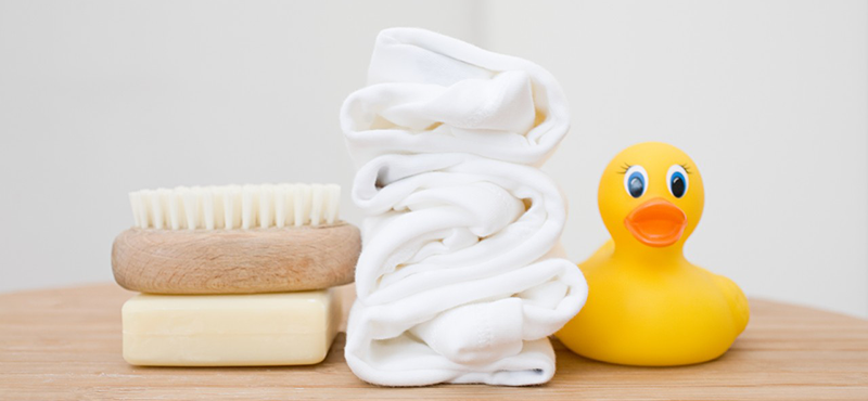 42-26602510 Baby bathroom accessories --- Image by © Image Source/Corbis