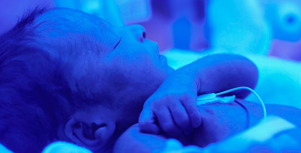 Premature Baby in Incubator --- Image by © Corbis