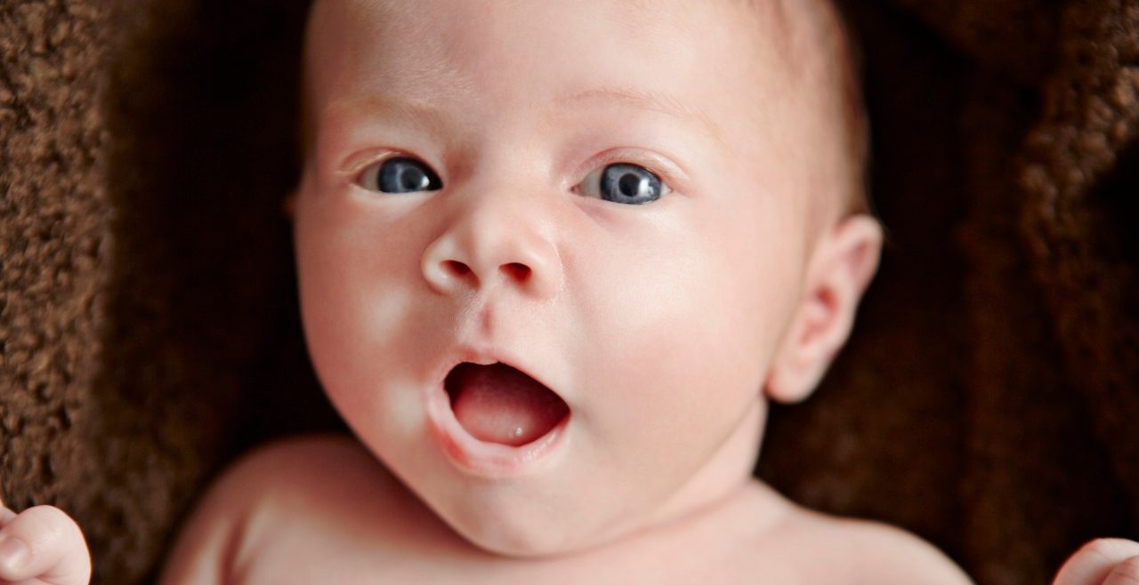 22 Jul 2013 --- Baby looking at camera --- Image by © Emma Kim/Corbis