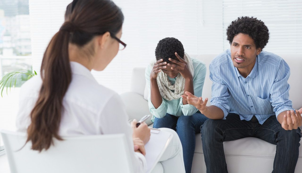 28 May 2014 --- Angry couple talking to their therapist --- Image by © Wavebreakmedia LTD/Wavebreak Media Ltd./Corbis