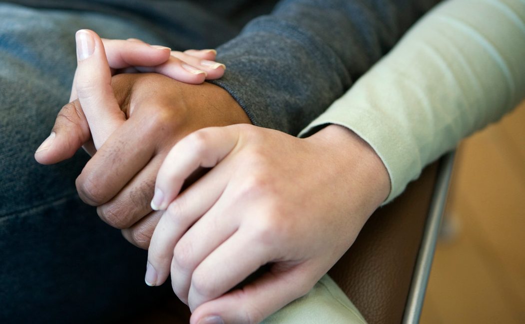 Couple Holding Hands --- Image by © Timothy Tadder/Corbis