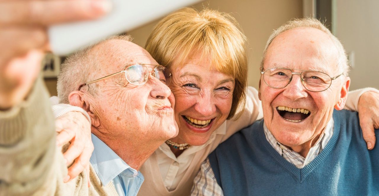 0042-11-30T00:00:00.000Z 13 Feb 2015 --- Cheerful seniors taking selfie --- Image by © Uwe Umstätter/Westend61/Corbis