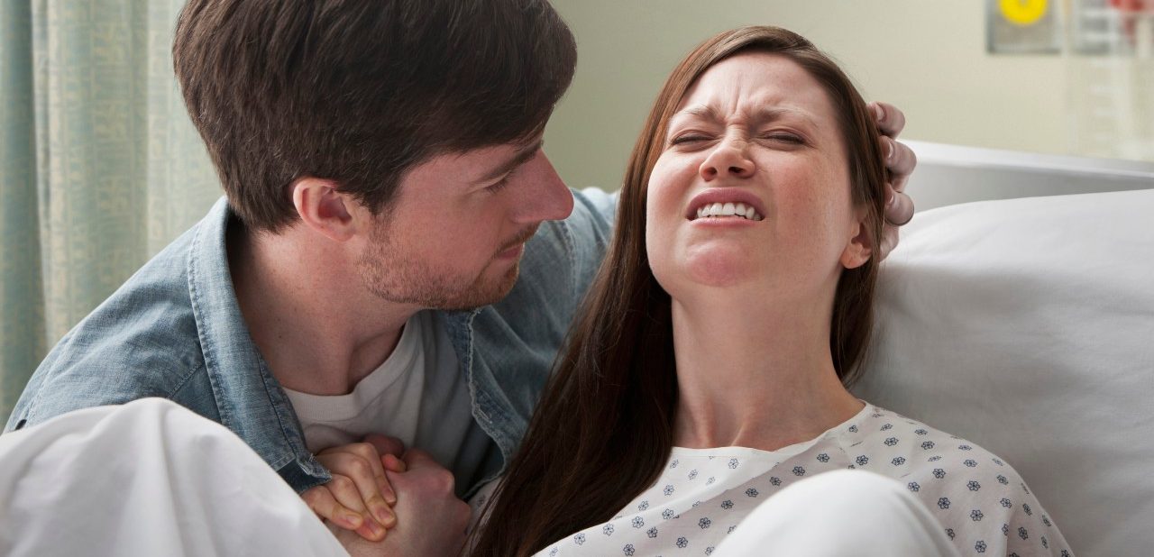 0042-11-30T00:00:00.000Z 08 Feb 2012 --- Caucasian man helping girlfriend deliver baby --- Image by © KidStock/Blend Images/Corbis