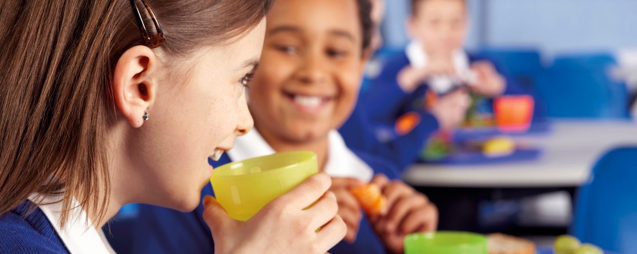 School Children Eating a Healthy Lunch --- Image by © David Ashley/Corbis
