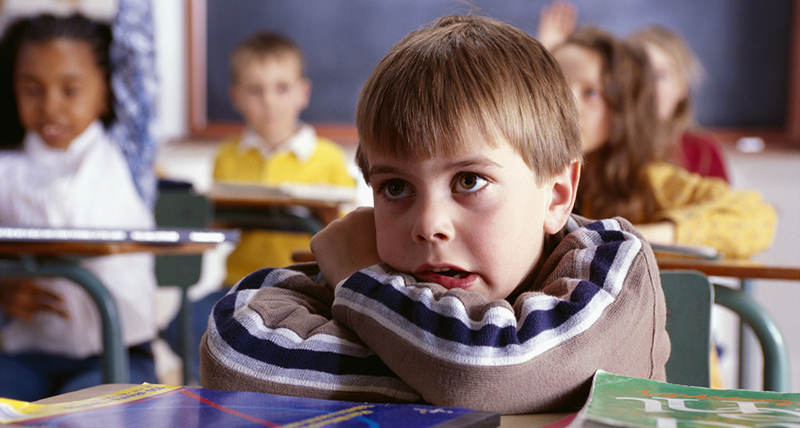 Worried Boy in First Grade --- Image by © Dann Tardif/LWA/Corbis