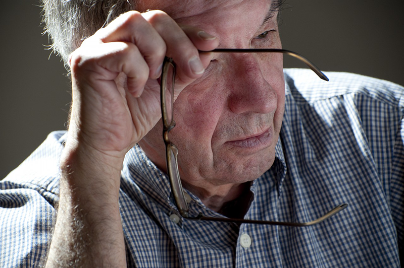 28 Jun 2012, England, UK --- concerned mature seventy year old retired person --- Image by © David Burton/Corbis