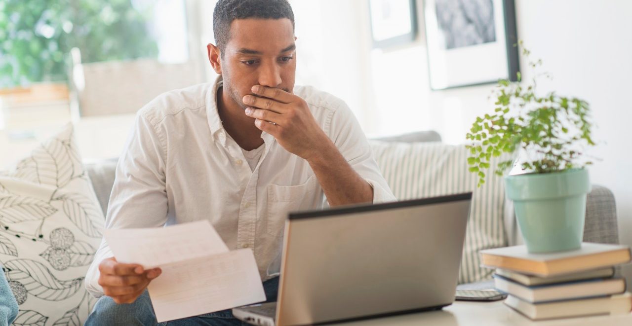 0042-11-30T00:00:00.000Z 09 Oct 2014 --- Man paying bills online --- Image by © Tetra Images/Corbis