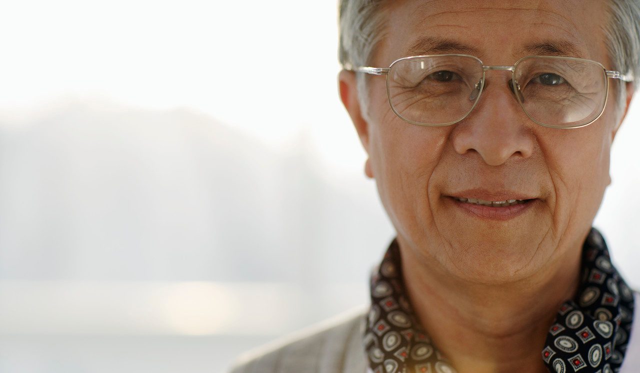 0042-11-30T00:00:00.000Z Senior Man with Glasses --- Image by © Floresco Productions/Corbis