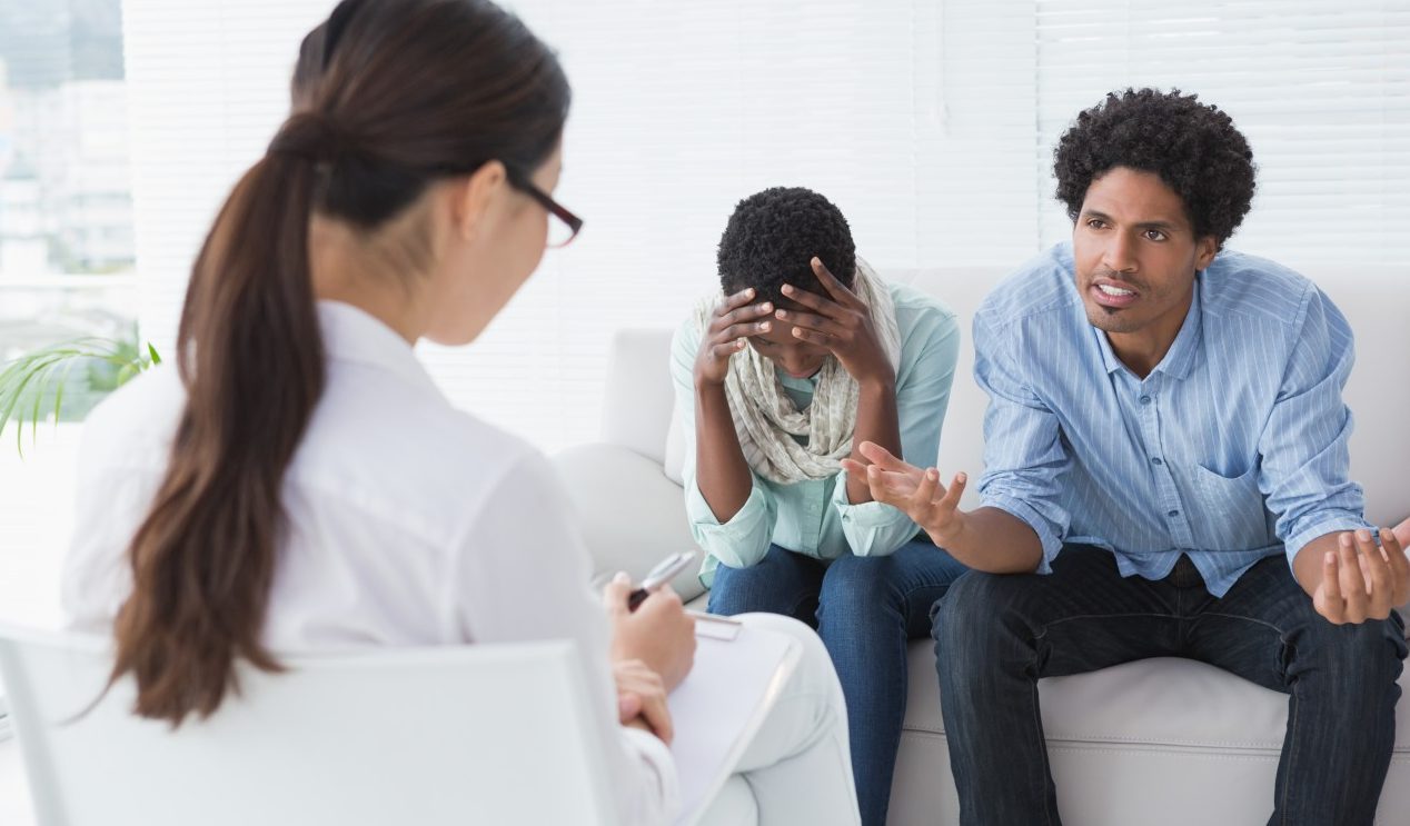 28 May 2014 --- Angry couple talking to their therapist --- Image by © Wavebreakmedia LTD/Wavebreak Media Ltd./Corbis