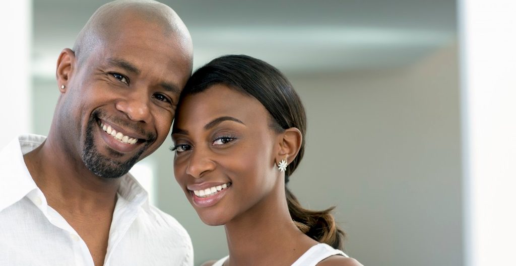 0042-11-30T00:00:00.000Z 01 Apr 2012 --- Smiling Black couple --- Image by © Inti St Clair/Blend Images/Corbis