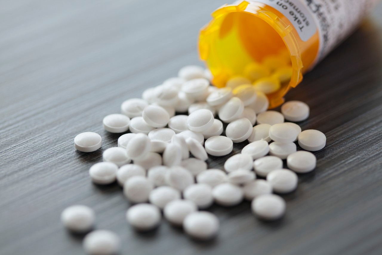 10 Apr 2012 --- White pills spilled on table. --- Image by © Hero Images/Corbis