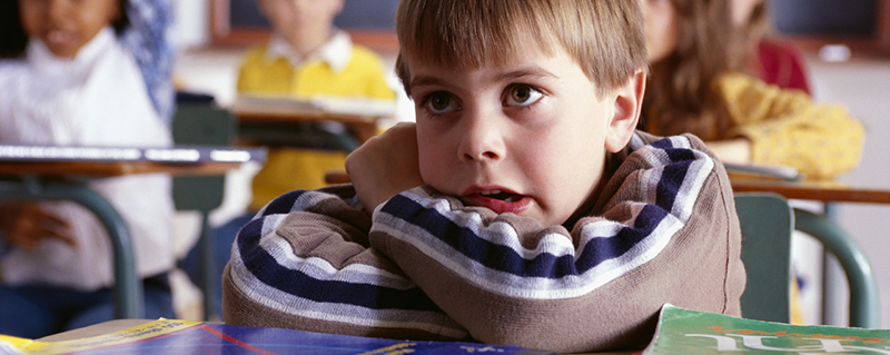 Worried Boy in First Grade --- Image by © Dann Tardif/LWA/Corbis