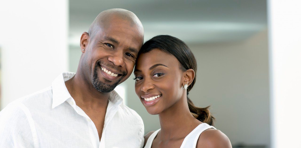 0042-11-30T00:00:00.000Z 01 Apr 2012 --- Smiling Black couple --- Image by © Inti St Clair/Blend Images/Corbis