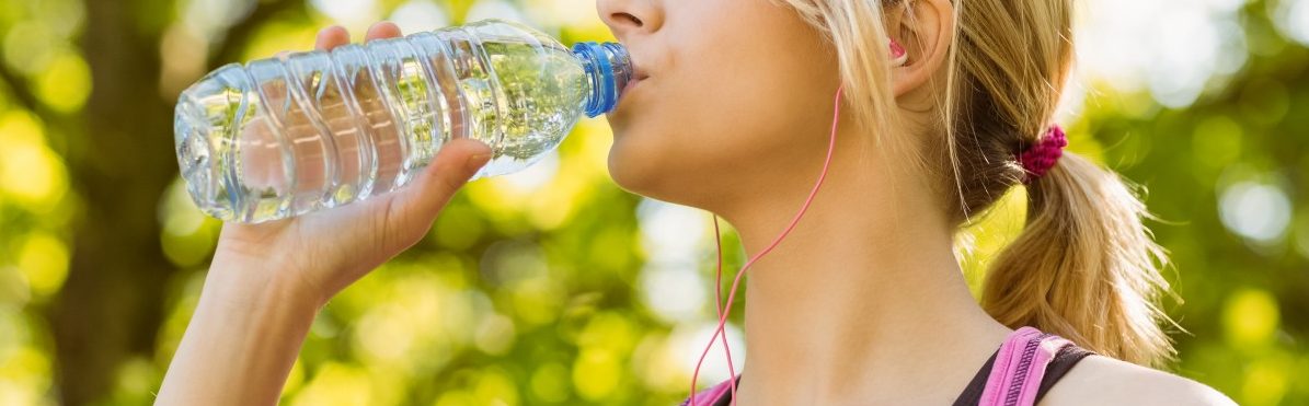 28 May 2014 --- Fit blonde drinking from her water bottle --- Image by © Wavebreak Media LTD/Wavebreak Media Ltd./Corbis