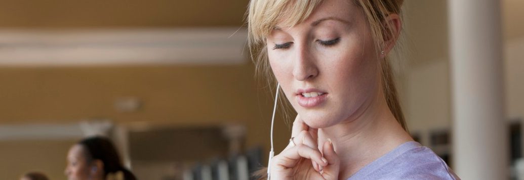 11 May 2012 --- Caucasian woman checking pulse in gym --- Image by © Jose Luis Pelaez Inc/Blend Images/Corbis