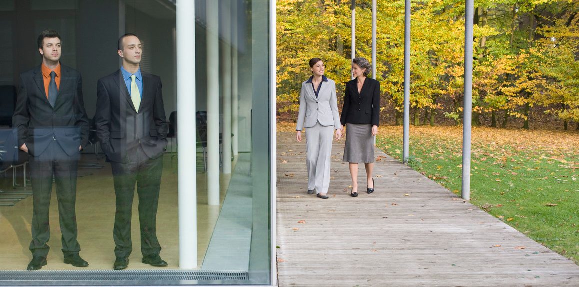 0042-11-30T00:00:00.000Z Businesswomen Walking Beside a Building --- Image by © Heide Benser/Corbis