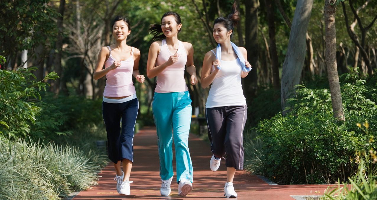 0042-11-30T00:00:00.000Z Young Women Power Walking --- Image by © Redlink Production/Corbis
