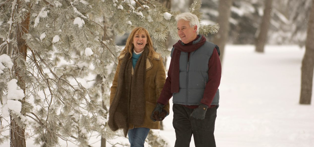 Couple out for a walk in the woods --- Image by © Jason Stang/Corbis
