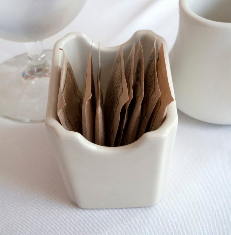 Artificial sweeteners in a holder on a table --- Image by © 145/Bill Boch/Ocean/Corbis