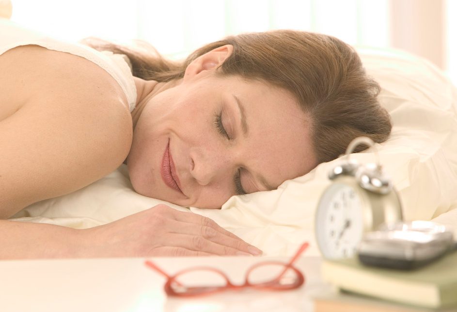 CBR001254 Woman Sleeping Peacefully --- Image by © Tom Grill/Corbis