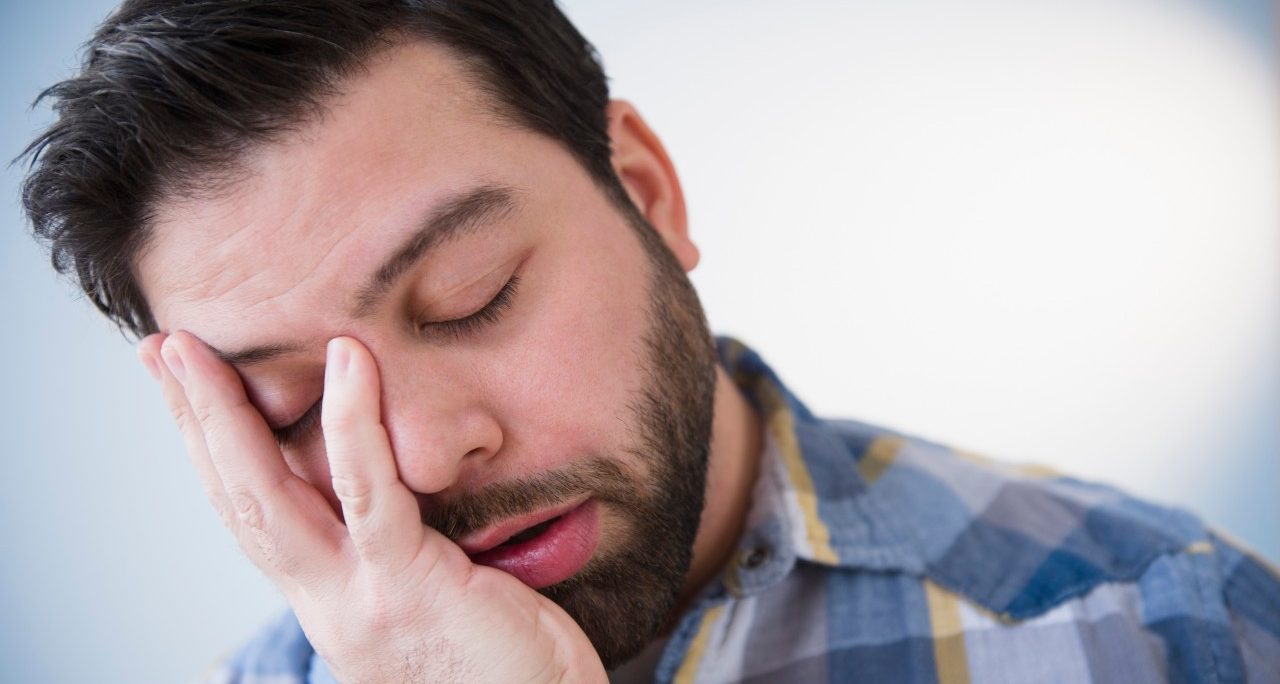 20 Feb 2013 --- Portrait of tired man --- Image by © Jamie Grill/Tetra Images/Corbis